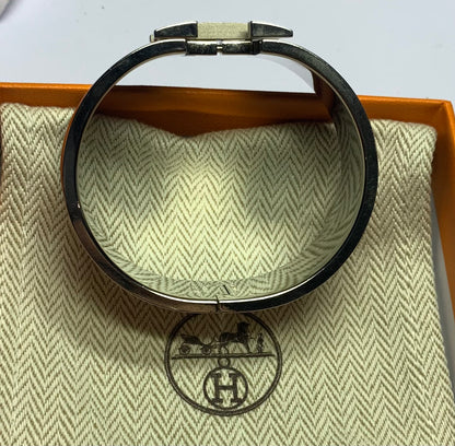 Authentic Hermès Clic Clac H Orange Enamel Palladium Plated Wide Bracelet - Used