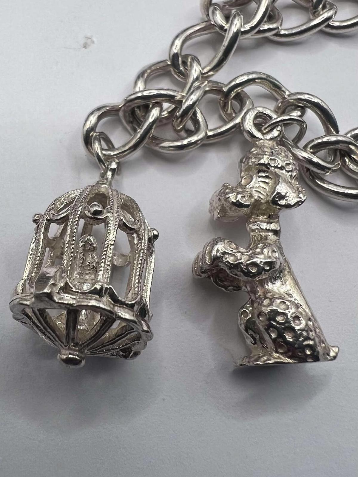 Quality 925 Sterling Silver Charm Bracelet - 37.22 Grams