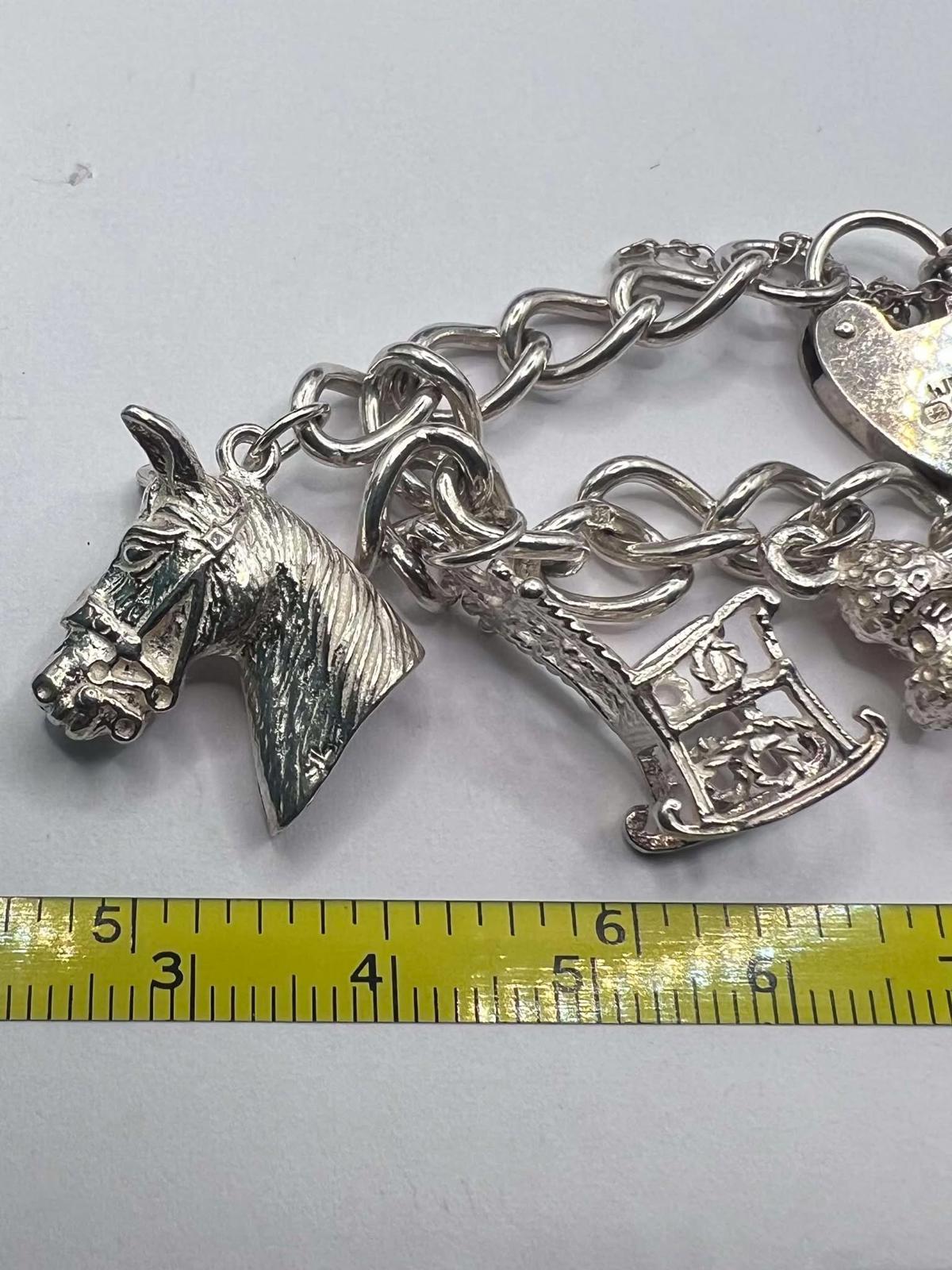 Quality 925 Sterling Silver Charm Bracelet - 37.22 Grams