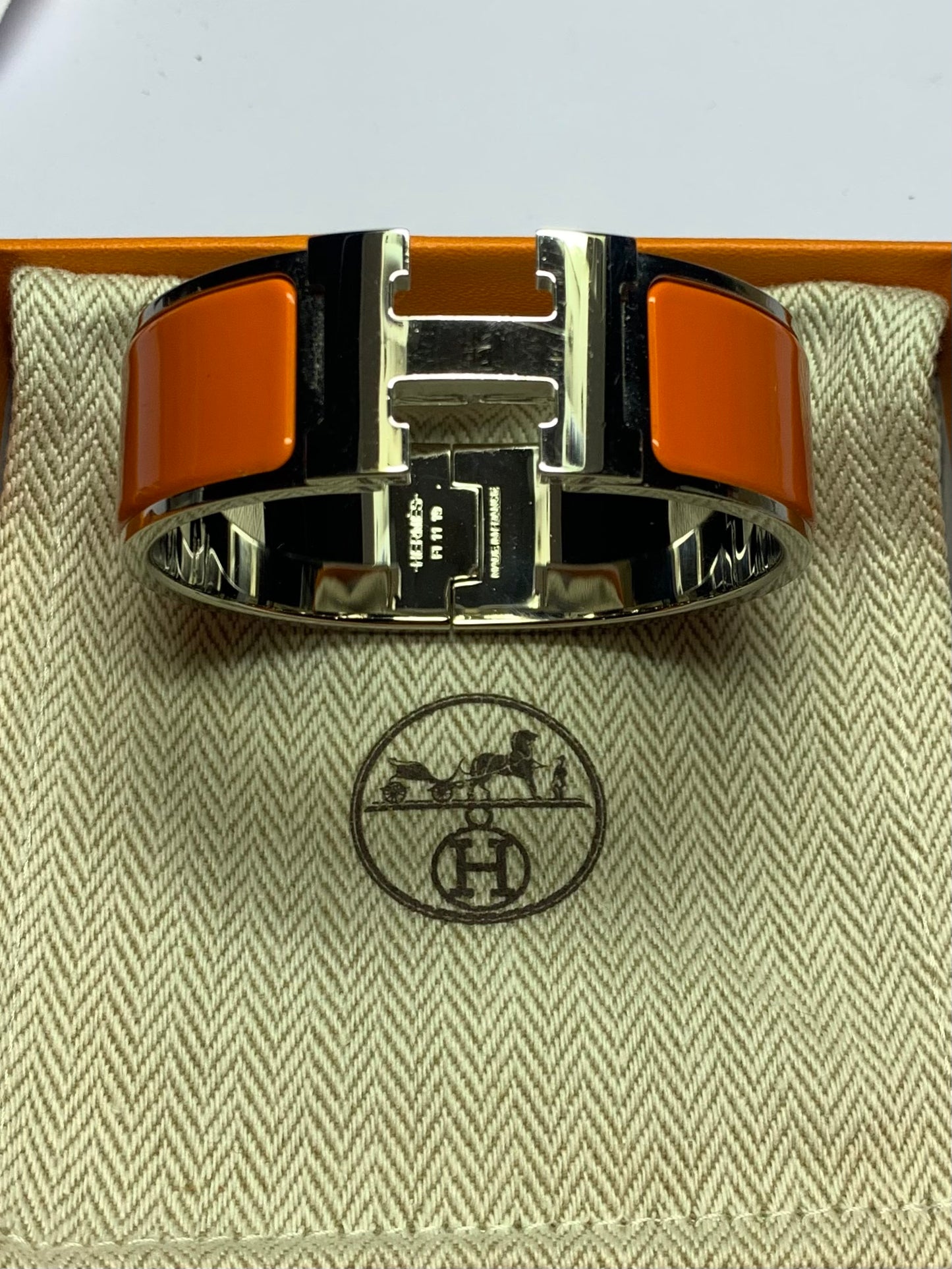 Authentic Hermès Clic Clac H Orange Enamel Palladium Plated Wide Bracelet - Used