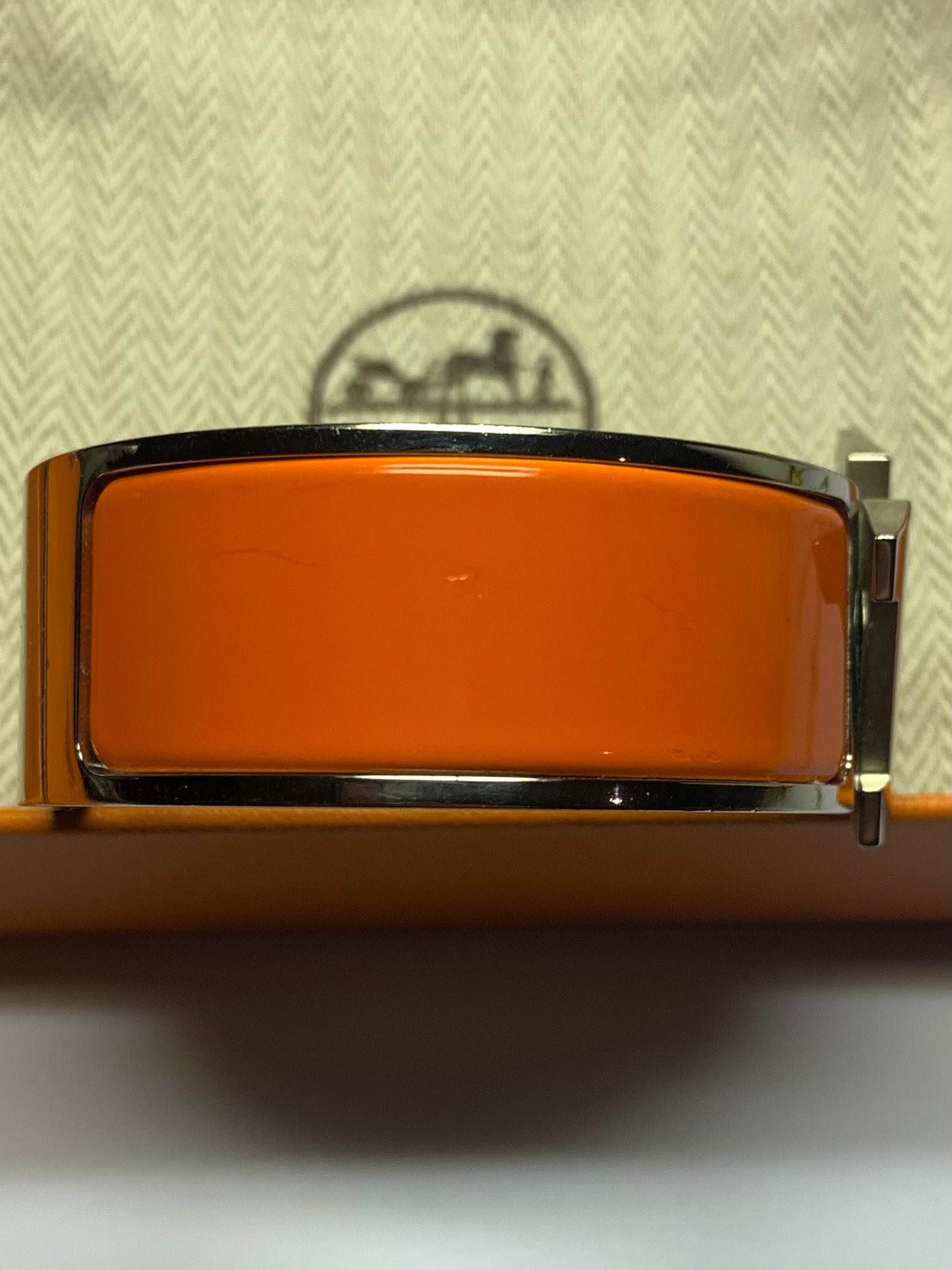 Authentic Hermès Clic Clac H Orange Enamel Palladium Plated Wide Bracelet - Used