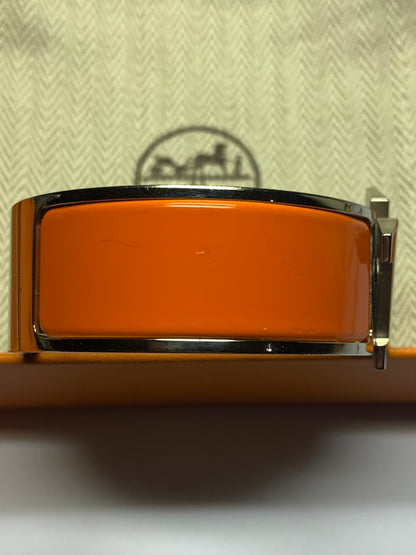 Authentic Hermès Clic Clac H Orange Enamel Palladium Plated Wide Bracelet - Used