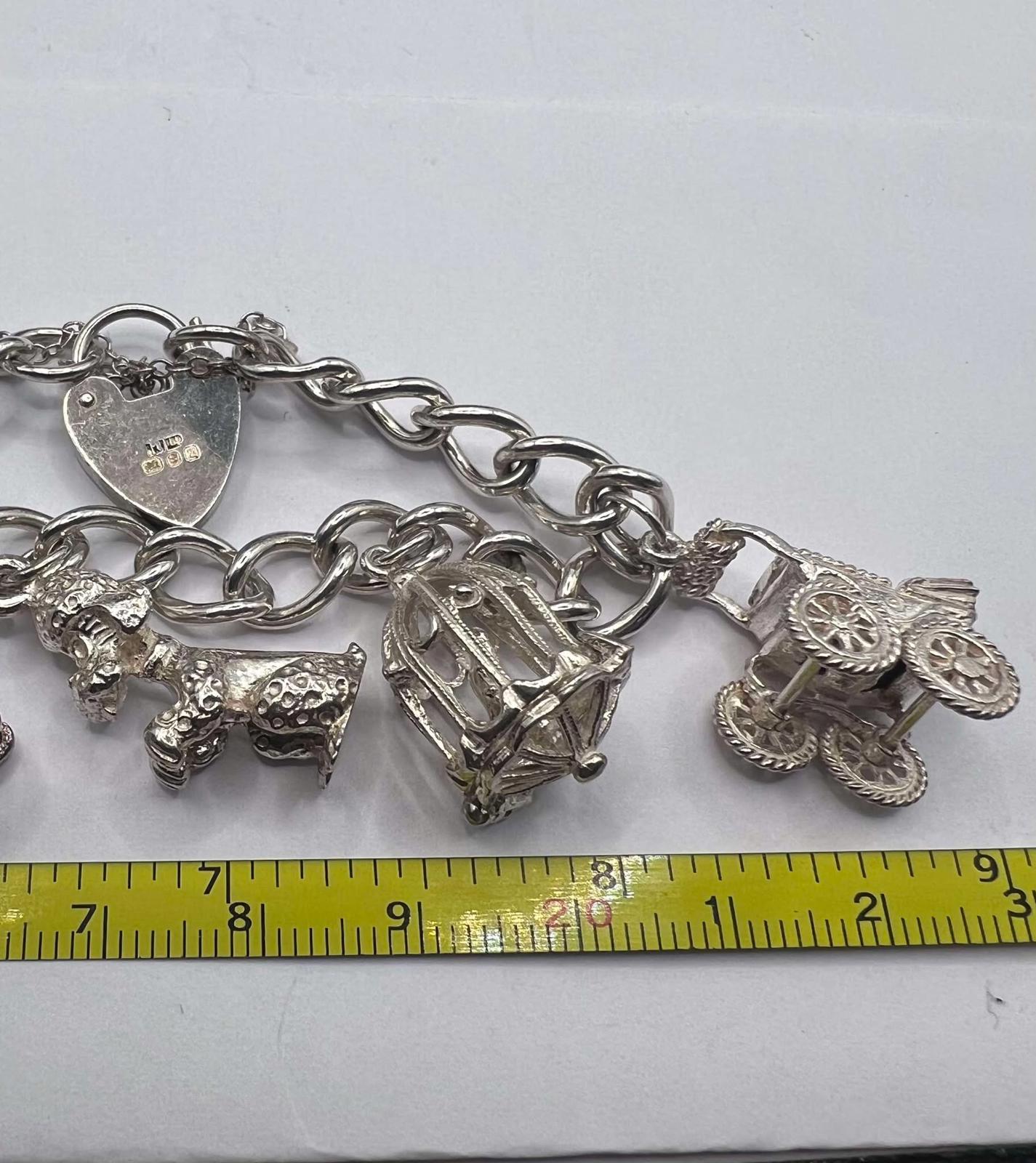 Quality 925 Sterling Silver Charm Bracelet - 37.22 Grams