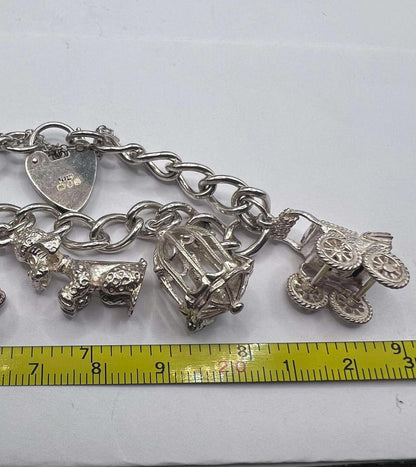 Quality 925 Sterling Silver Charm Bracelet - 37.22 Grams