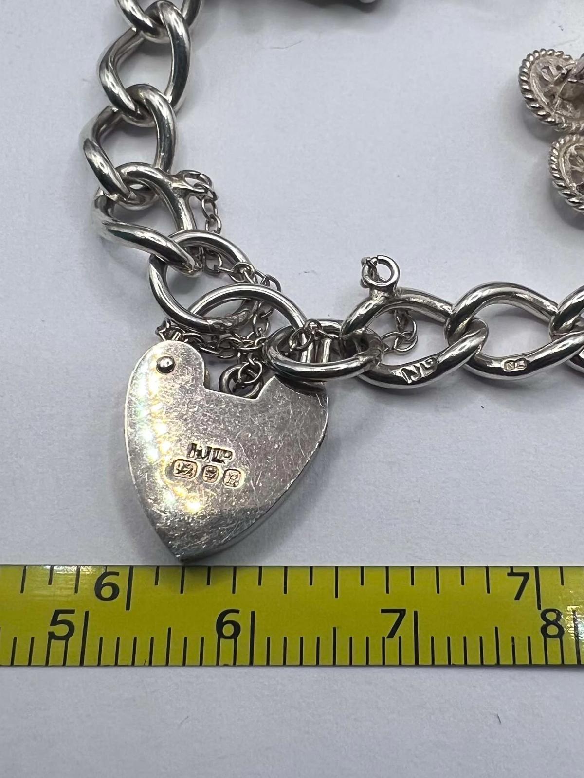 Quality 925 Sterling Silver Charm Bracelet - 37.22 Grams