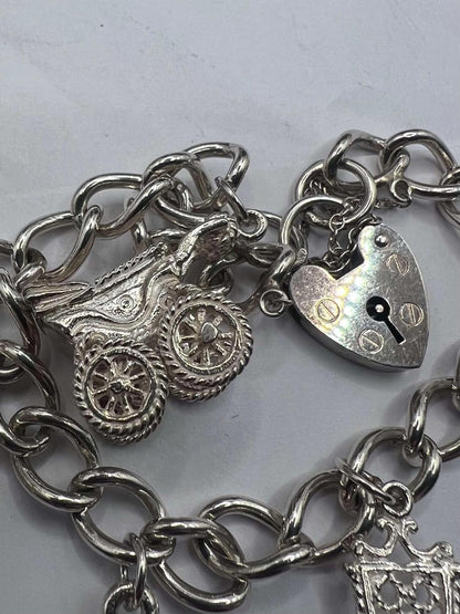 Quality 925 Sterling Silver Charm Bracelet - 37.22 Grams